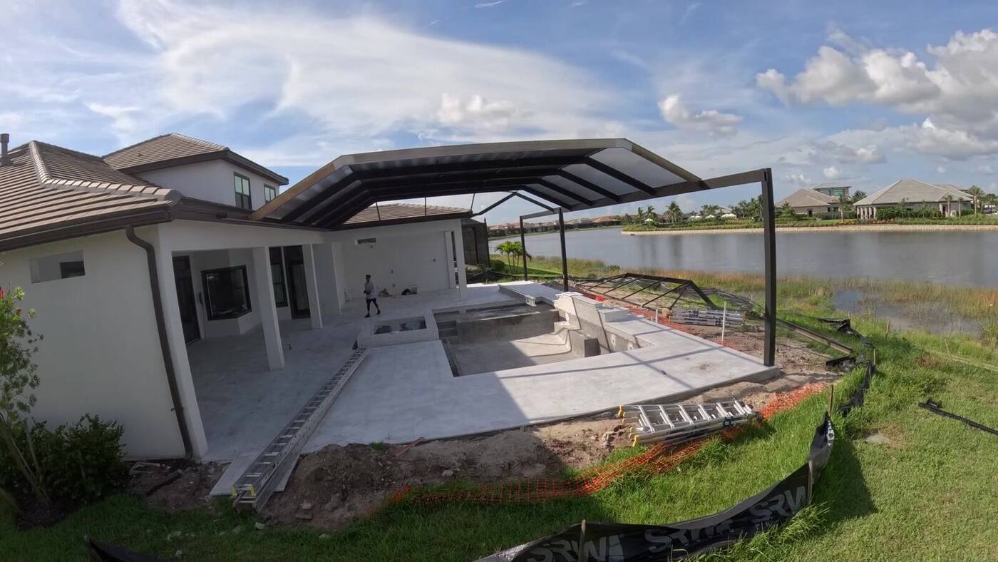 A cage frame going up on a lake lot